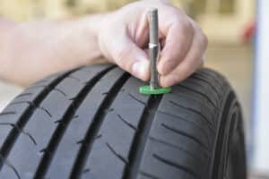 checking treads of tyre